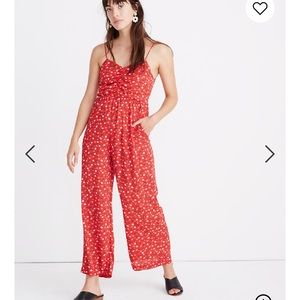 Red made well jump suit